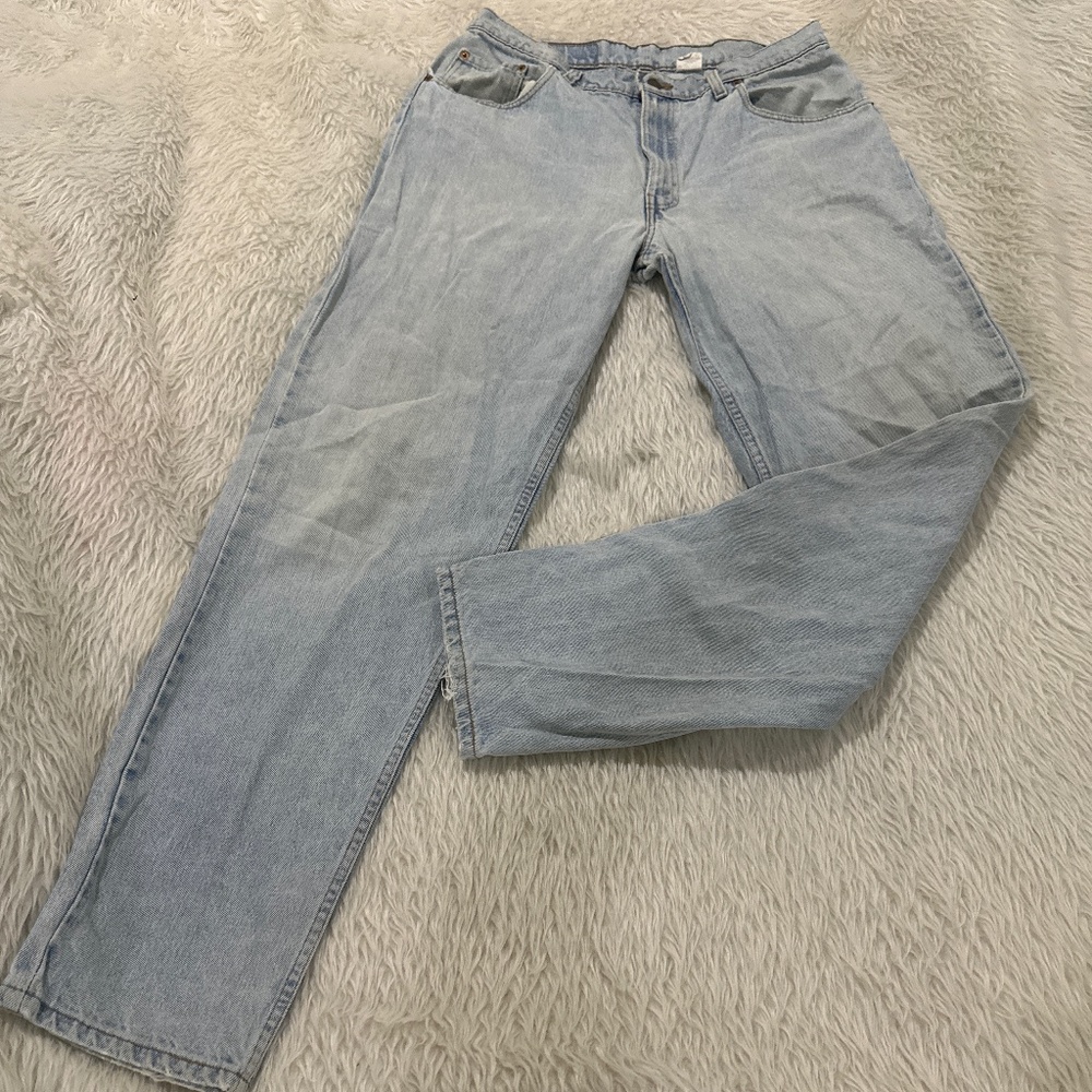 Vintage Levi’s 560 men’s light wash distressed denim blue jeans size 36x…